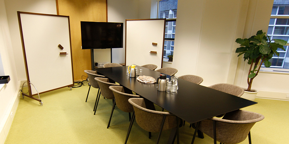 whiteboard with dark wooden frame